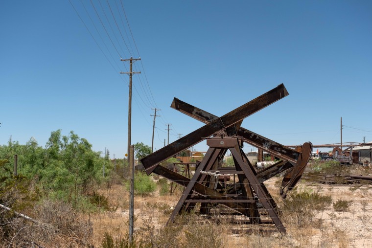 Image: An oil pump well near the Loving County Courthouse.
