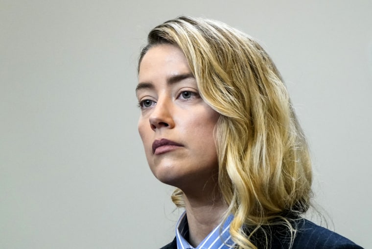 Amber Heard returns to the courtroom after a lunch break at the Fairfax County Circuit Court in Fairfax, Va., on May 4, 2022.