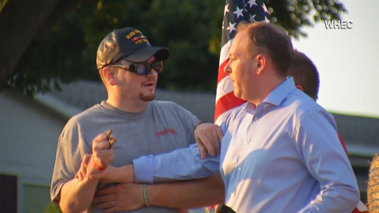Rep. Lee Zeldin is attacked on stage by a spectator during a campaign event in Fairport, N.Y. on July 21, 2022.
