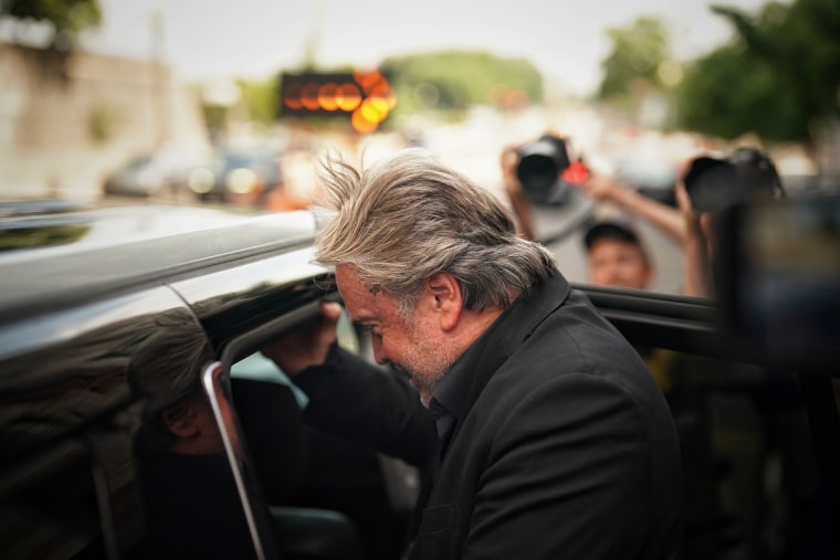 Pictured: Steve Bannon exits US District Court in Washington on July 22, 2022.