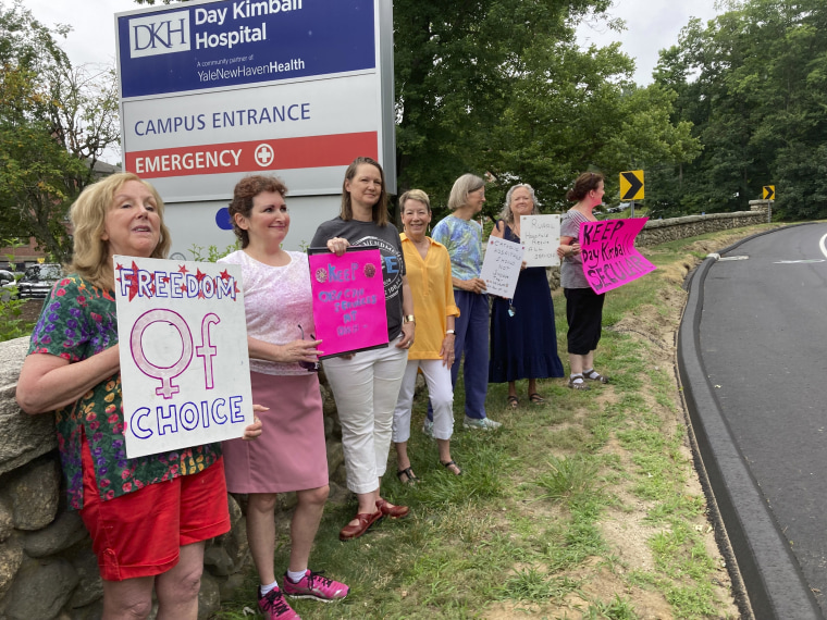 Residents from various communities in mostly rural northeastern Connecticut stage a protest outside Day Kimball Hospital