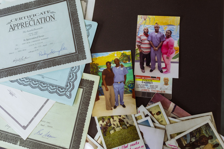 Image: Diplomas and photographs of family members visiting Thomas Raynard James while in prison.