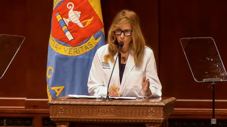 Image: Assistant Professor of Medicine, Kristin Collier speaks at the University of Michigan White Coat ceremony in Ann Arbor, Mich. on July 24, 2022.