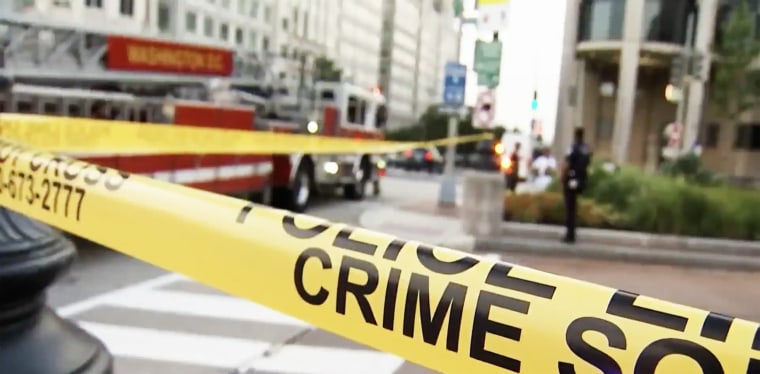 Caution tape at the scene of a shooting at the Mandarin Oriental Hotel