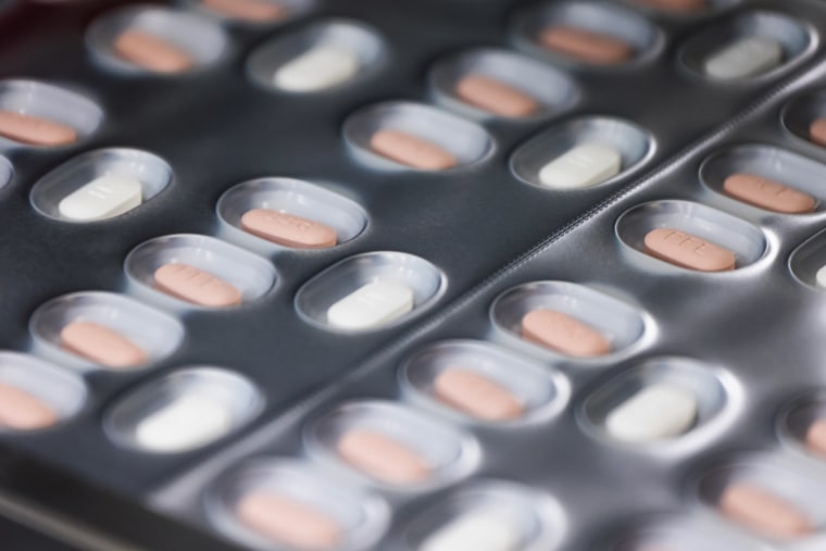 Tablets of the drug Paxlovid pass through a packaging line at a Pfizer facility in Baden-Wuerttemberg, Germany, on May 24, 2022.