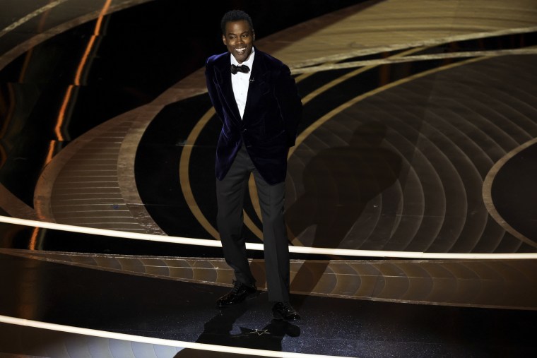 Image:  Chris Rock speaks onstage during the 94th Annual Academy Awards on March 27, 2022 in Hollywood, Calif.