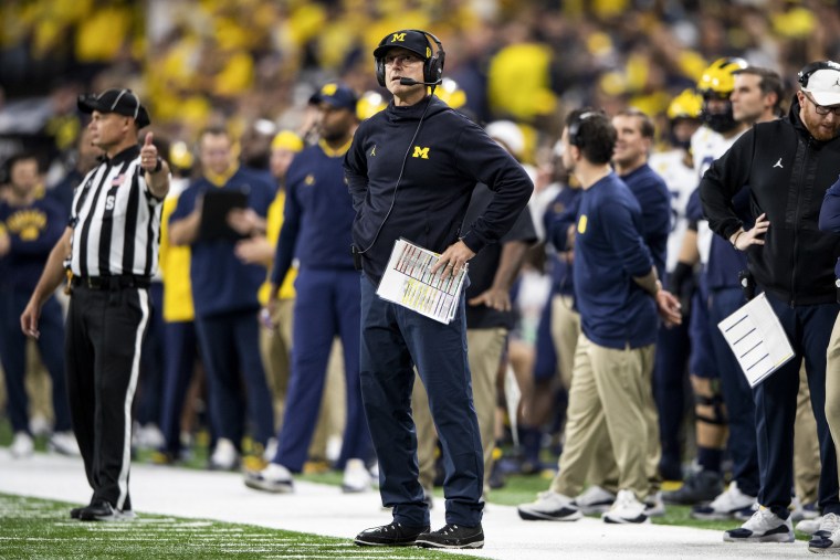 Image: Jim Harbaugh on the sidelines during the Big 10 Championship game between the Michigan Wolverines and Iowa Hawkeyes on December 4, 2021 in Indianapolis, Ind.