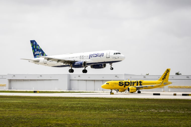 JetBlue and Spirit airplanes at Fort Lauderdale-Hollywood International Airport in Fort Lauderdale, Fla., on May 21, 2022.