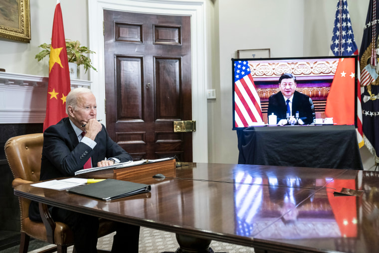 President Joe Biden listens while meeting virtually with Chinese President Xi Jinping in the Roosevelt Room of the White House on Nov. 15, 2021.