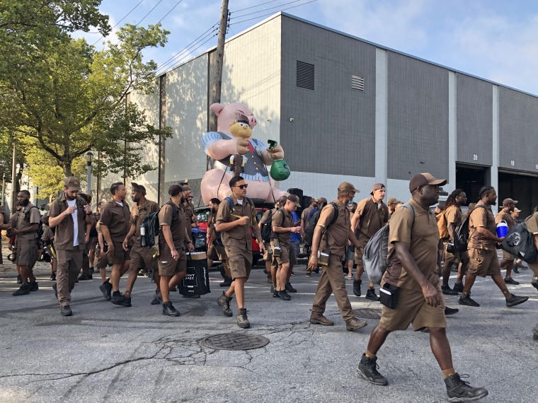 UPS workers protest near a company warehouse in Brooklyn, N.Y., on July 28, 2022.