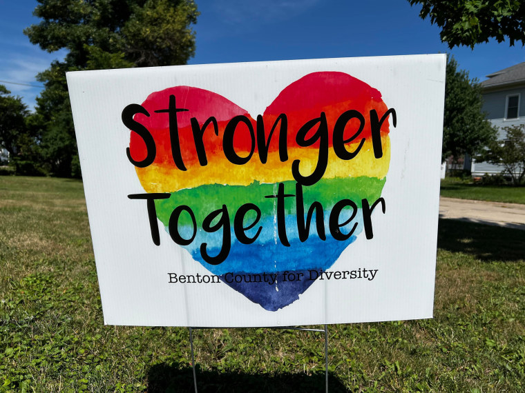 A sign promoting diversity on the front law of Molly Rach's house.