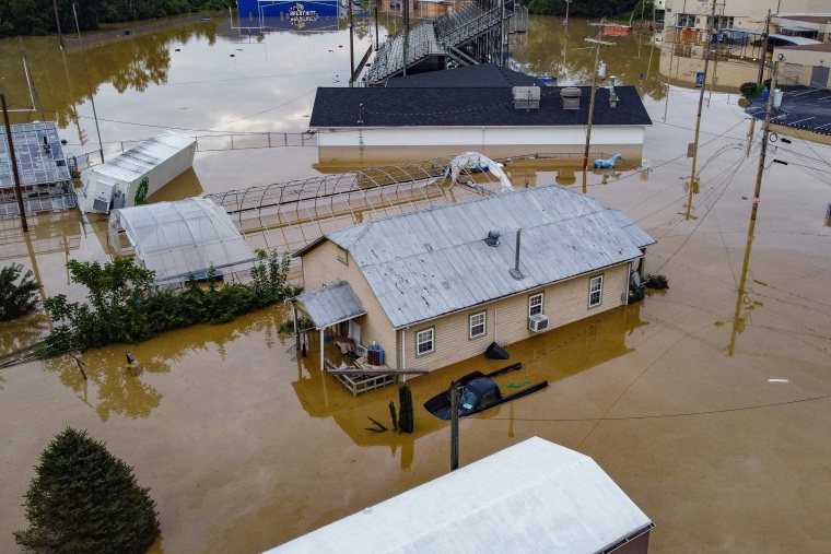 Homes submerged under flood waters from the Kentucky River