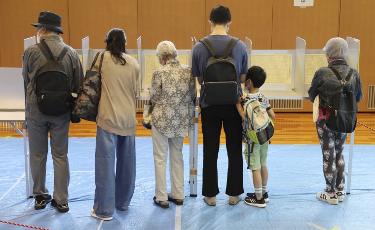 People at a polling station in Tokyo on Sunday.