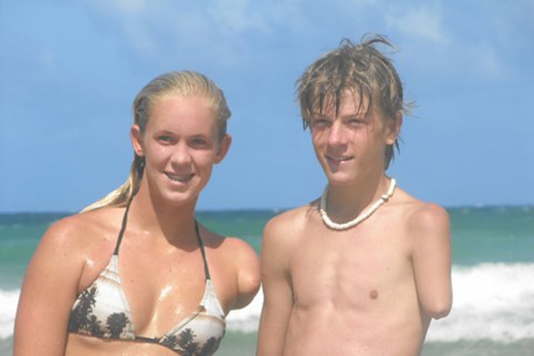 Logan Aldridge, seen here with surfer Bethany Hamilton, learned about adaptive extreme sports somewhat randomly and was able to watch other athletes compete in a modified way.