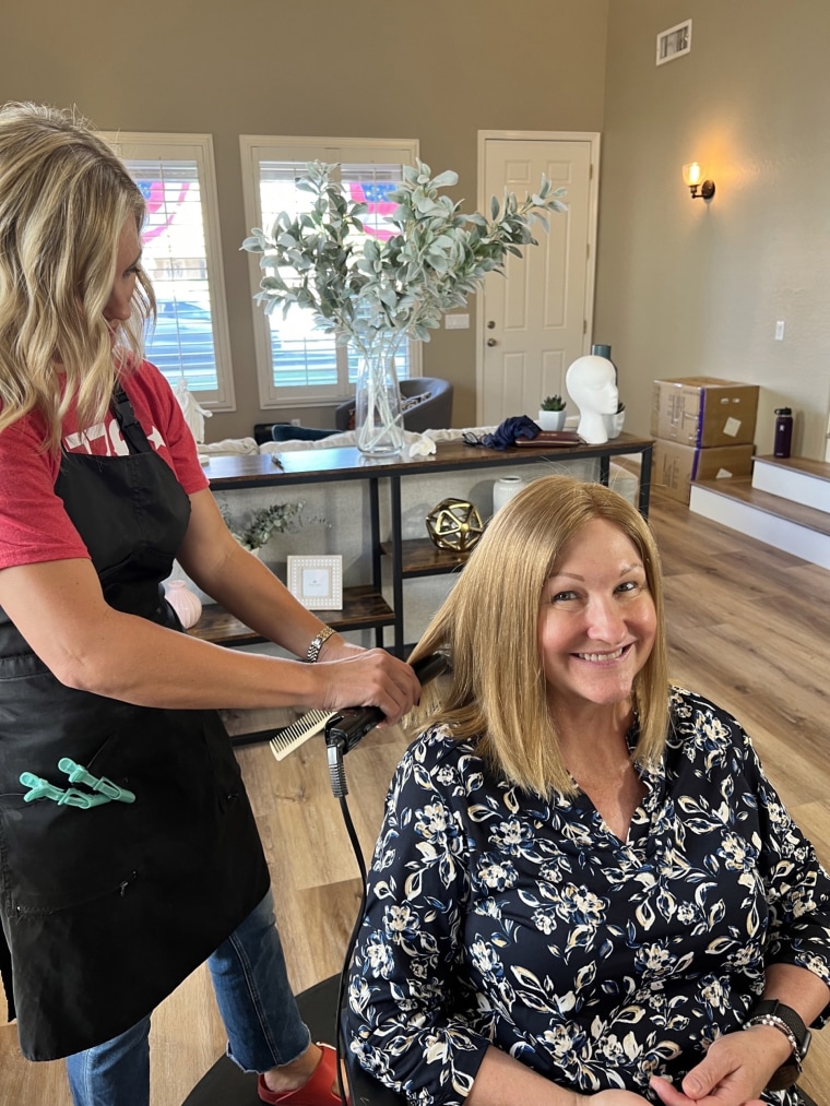 Melanie Shaha of Arizona got her wig styled, a gift from her son Matt, who donated his hair for the piece.