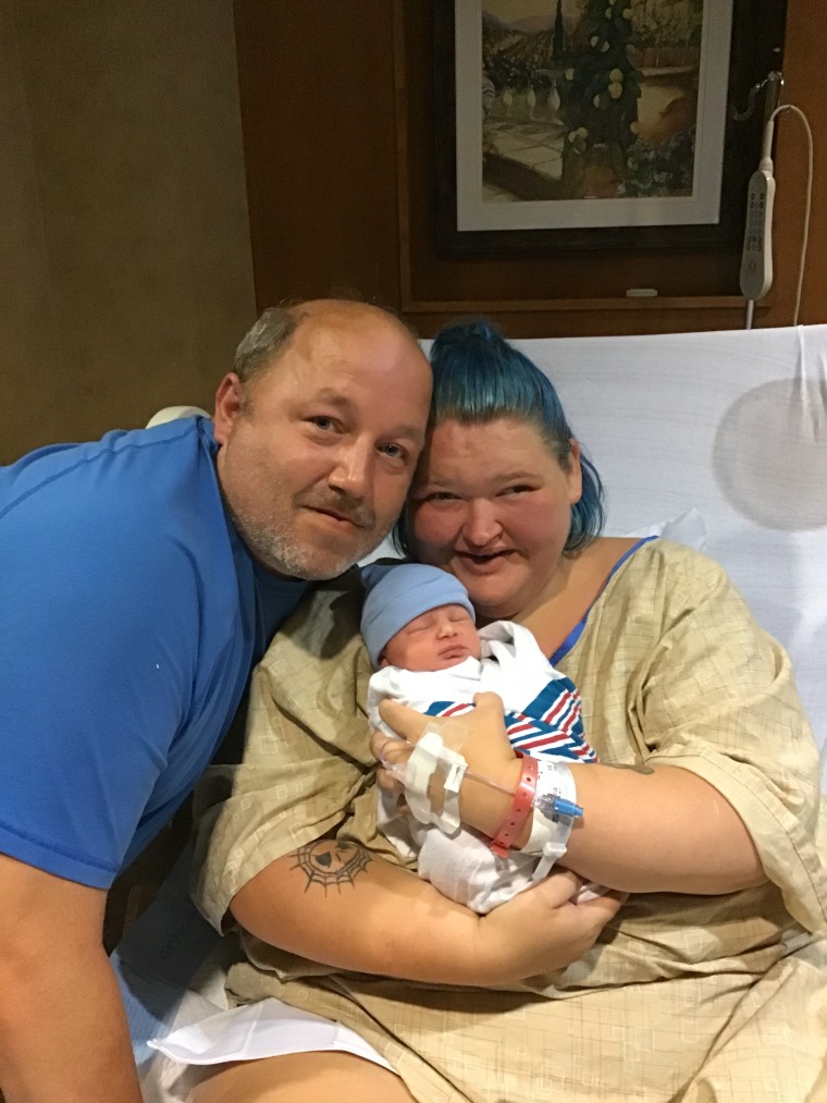 Amy Slaton (R) and husband Michael with their new son, Glenn.