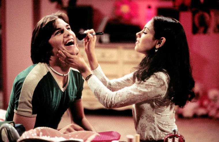 Ashton Kutcher and Mila Kunis on That 70's Show.