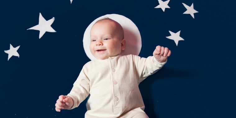 Infant on blue background