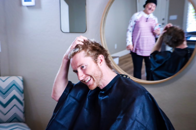 Matt Shaha of Arizona after cutting his long hair to donate to mom Melanie, who needed a wig after suffering from a brain tumor.