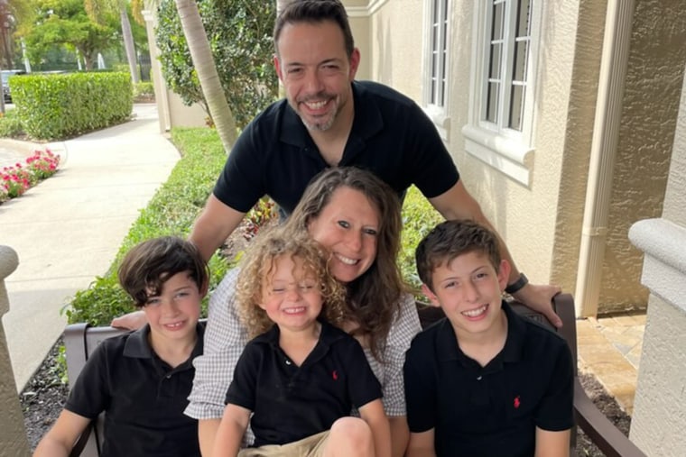 Shawn Cotreau, pictured with his wife, Jacqueline, and their three sons.