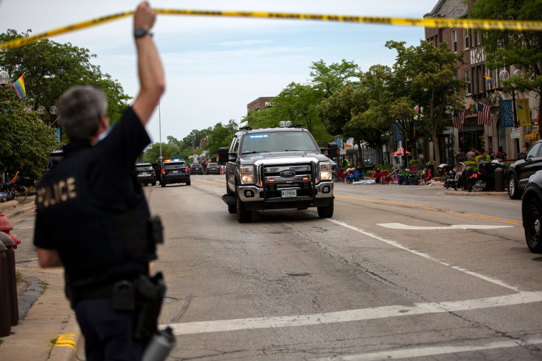 First responders work the scene of a shooting at a Fourth of July parade on July 4, 2022 in Highland Park, Illinois. Reports indicate at least five people were killed and 19 injured in the mass shooting.