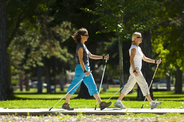Two women nordic walking in Salt Lake City, Utah.
