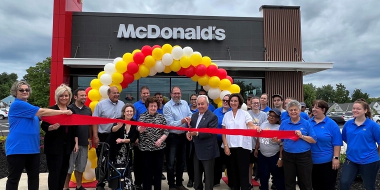The ribbon-cuting ceremony at the newly renovated McDonald's in Mayfield Heights, Ohio, helmed by Tony Philiou (center).