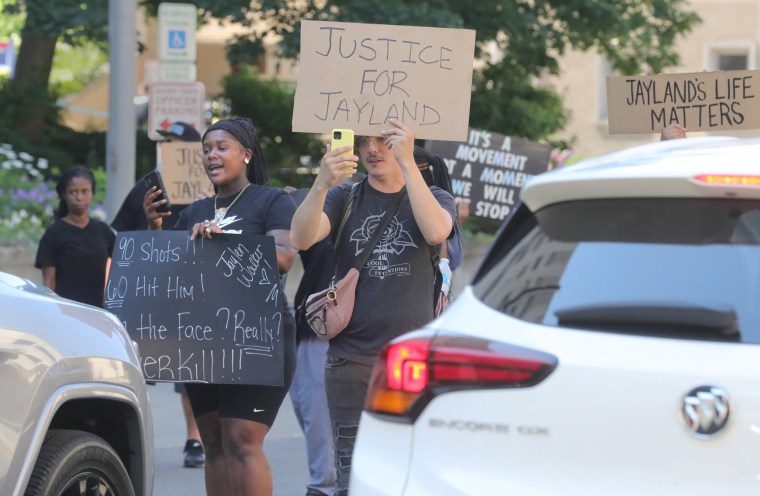 Protesters block traffic during a protest of the Akron police shooting death of Jayland Walker