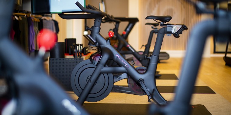 A Peloton stationary bike for sale at the company's showroom in Dedham, Massachusetts, U.S., on Wednesday, Feb. 3,  2021. Peloton Interactive Inc. is scheduled to release earnings figures on February 4. Photographer: Adam Glanzman/Bloomberg via Getty Images