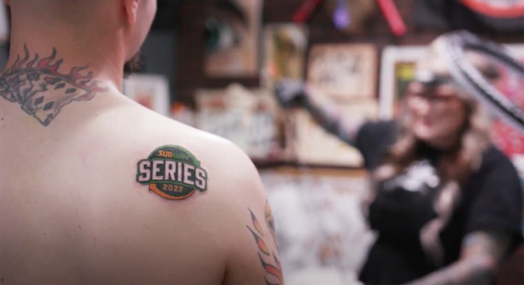 A participant who got a Subway Series tattoo at Bad Apple Tattoo.