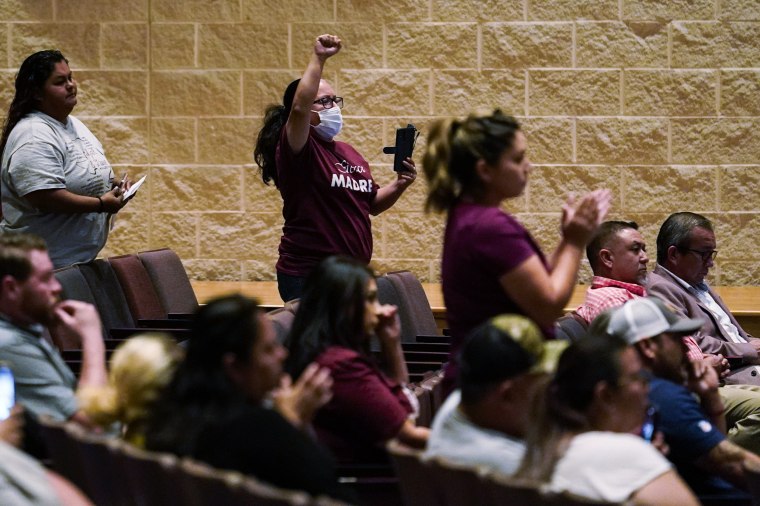Image: Parents and residents react during a Uvalde Consolidated Independent School District special school board meeting held to address concerns over last month's shootings at Robb Elementary School on July 18, 2022, in Uvalde, Texas.