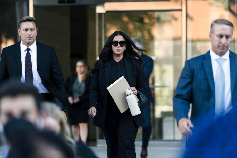 Image: Vanessa Bryant, center, the widow of Kobe Bryant, leaves a federal courthouse  on  Aug. 10, 2022 in Los Angeles, Calif.