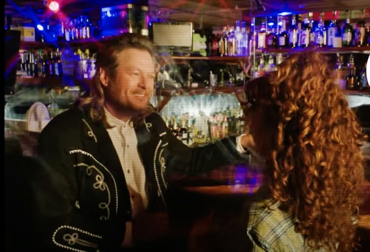 Image: Blake Shelton reveals his mullet in his 'No Body' official music video.
