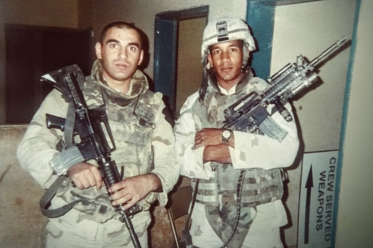 Image: David Carlson, right, during his first tour in Iraq 2005.