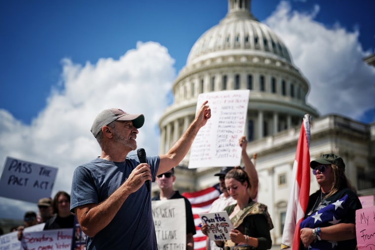 Image: Jon Stewart at a rally to call on the Senate to pass the Pact Act on Aug. 1, 2022.