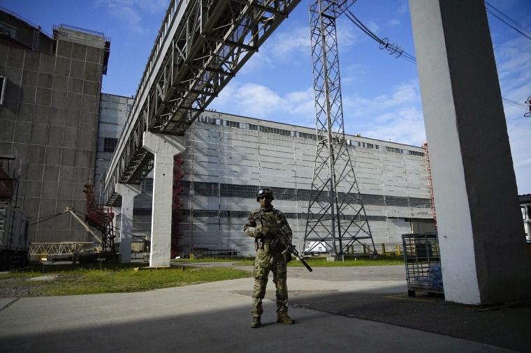Russian soldiers guard the Zaporizhzhia Nuclear Power Station, the largest in Europe, in southeastern Ukraine earlier this year. 