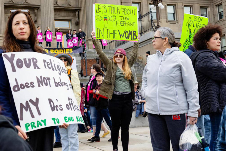 Image: People protest against the Supreme Court decision in Boise, Idaho on July 20, 2022.