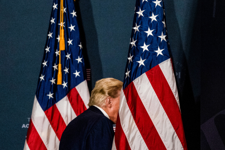 Former President Donald Trump departs after speaking at the America First Policy Institute's America First Agenda summit on July 26, 2022, in Washington.