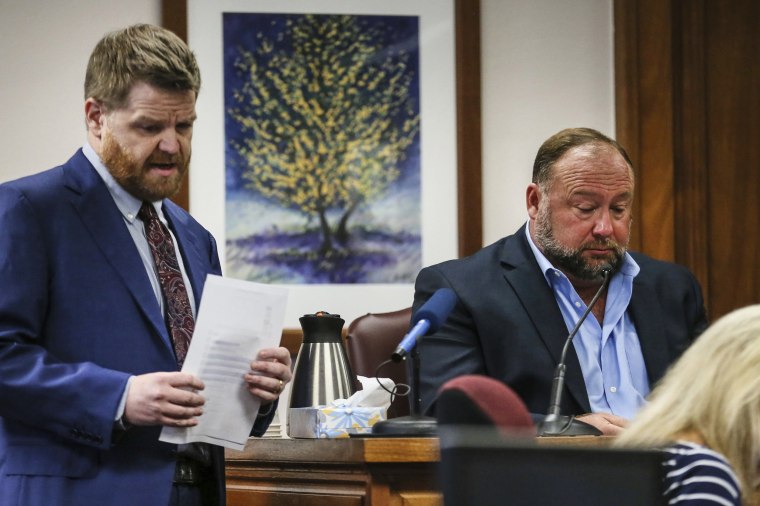 Image: Mark Bankston, lawyer for Neil Heslin and Scarlett Lewis, asks Alex Jones questions about text messages during trial at the Travis County Courthouse in Austin, on Aug. 3, 2022.