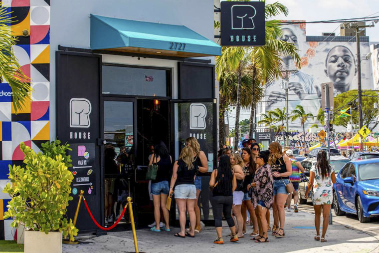 Image: People wait in line to check into their reservations for a Drag Brunch at R House Wynwood on April 9, 2022 in Miami, Fla.