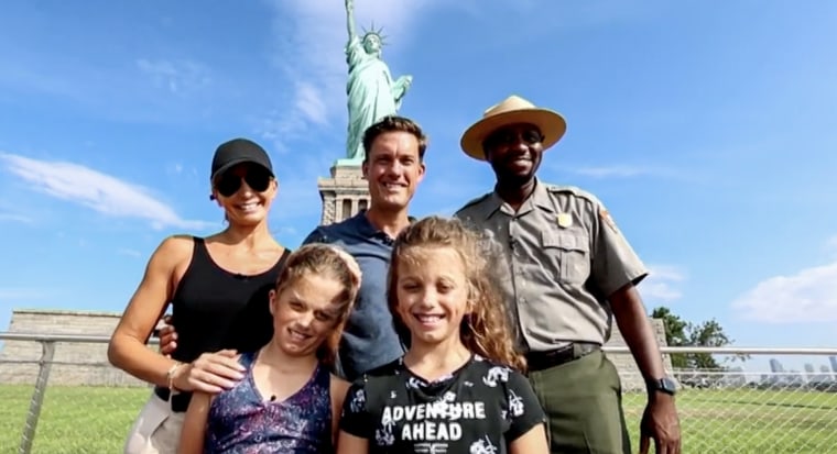 The Simmons family, with park ranger Renell, enjoyed its visit to the Statue of Liberty.