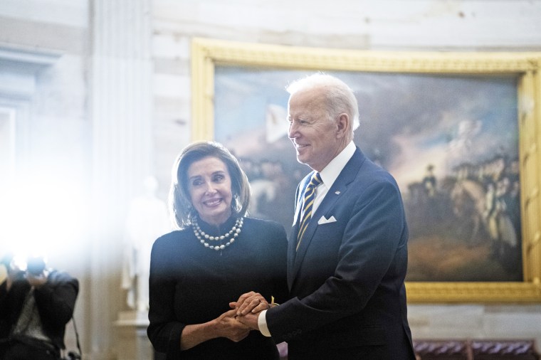 President Joe Biden and Speaker of the House Nancy Pelosi greet each other in the Rotunda at the Capitol in Washington, D.C. on Mar. 29, 2022.