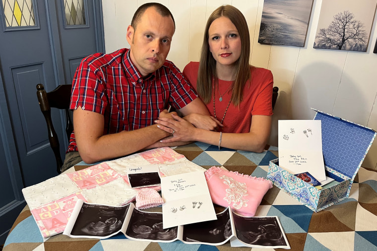 Melissa Janssen with her husband, Mijail Constante. Janssen's water broke when she was just 18 weeks pregnant, most likely too early for the baby to survive.