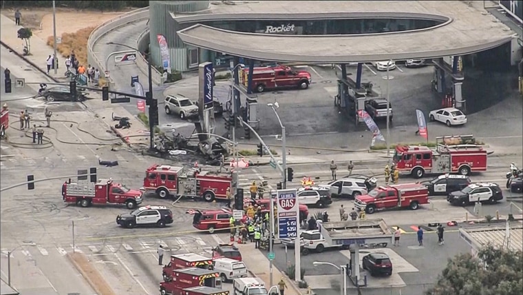 At least four people were killed in a fiery crash involving at least six cars at an intersection in Los Angeles' Windsor Hills area on Thursday.