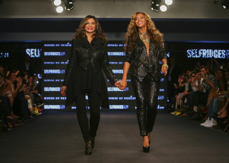 Image: Beyonce Knowles and her mother Tina during a House of Dereon Catwalk Show during London Fashion Week .