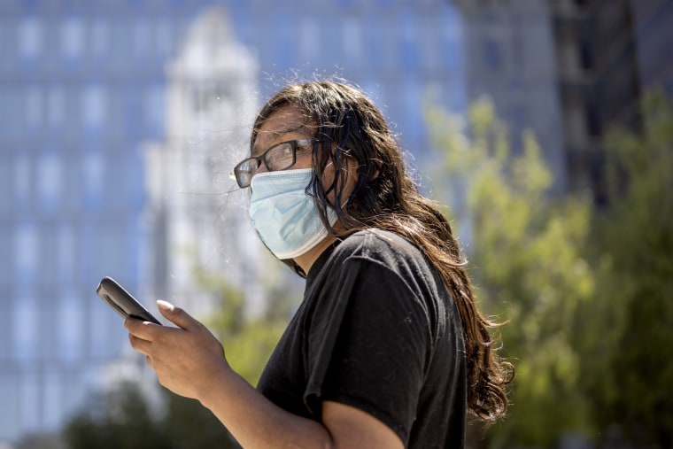 People wear masks in Los Angeles