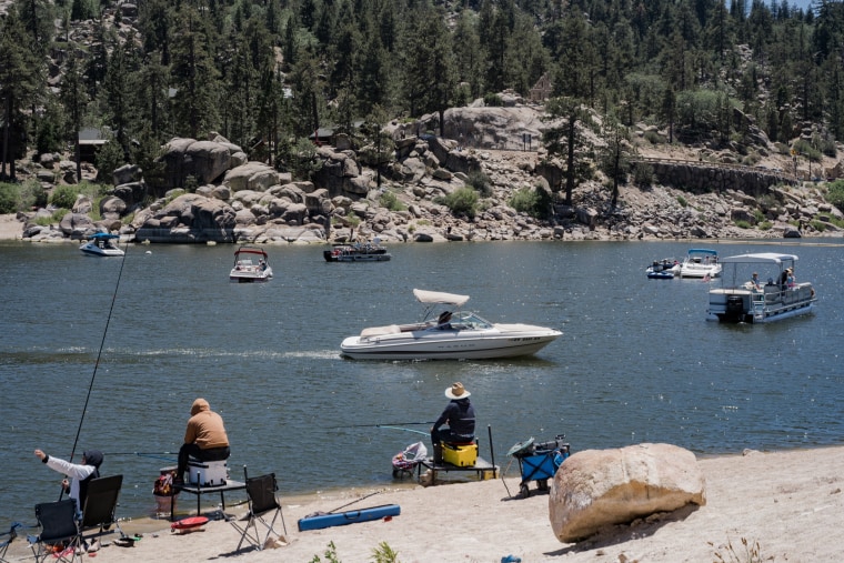 Image: Tourists and locals at Pine Oak Lane North Beach on Big Bear Lake on June 19, 2022.