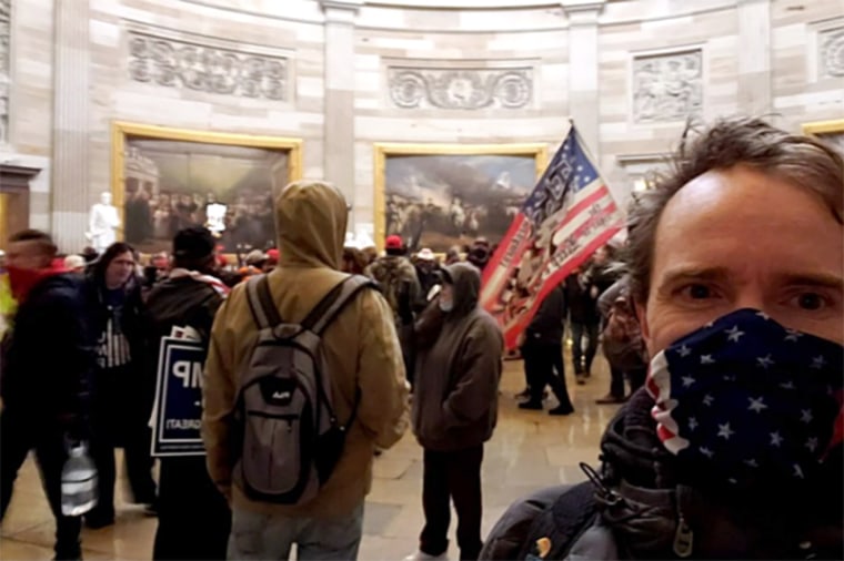 Jan. 6 defendant Tyler Slaeker, right, takes a selfie inside the U.S. Capitol, on Jan. 6, 2021.
