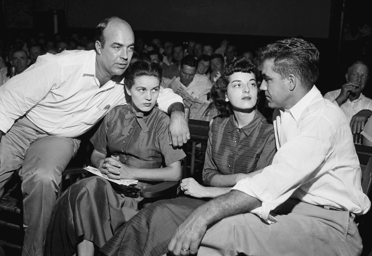 Image: J.W. Milam,  left, his wife, second left, Roy Bryant, far right, and his wife, Carolyn Bryant, in a courtroom in Sumner, Miss. on  Sept. 23, 1955. Bryant and his half-brother Milam were charged with murder but acquitted in the kidnapping and torture slaying of 14-year-old black teen Emmett Till in 1955 after he allegedly whistled at Carolyn Bryant.