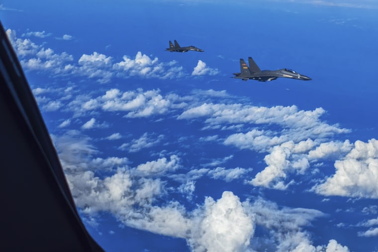 Chinese fighter jets conduct joint combat training exercises around Taiwan on Sunday. 